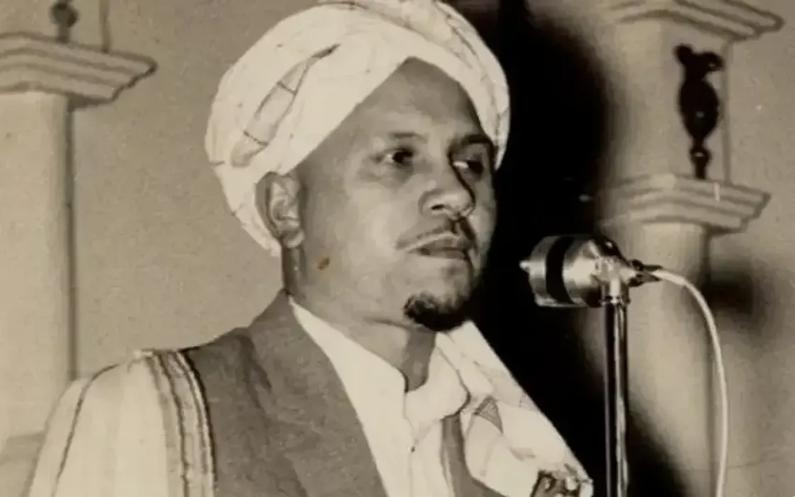 Imam Abdullah Haron speaking at a microphone